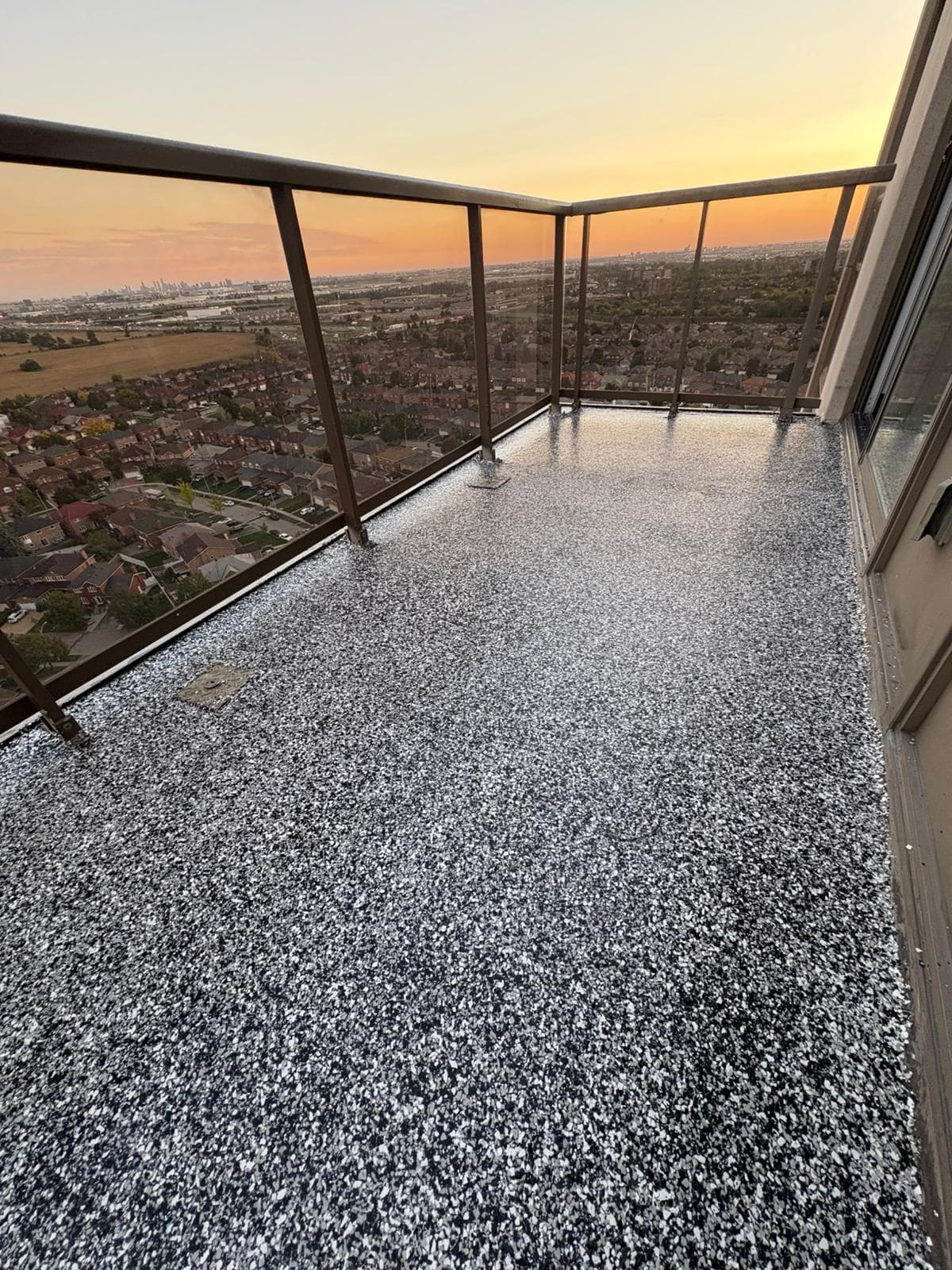 High-Rise Balcony Transformation - Epoxy flooring project in Pickering, ON